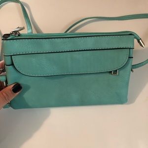 Turquoise clutch/ crossbody bag. Never worn